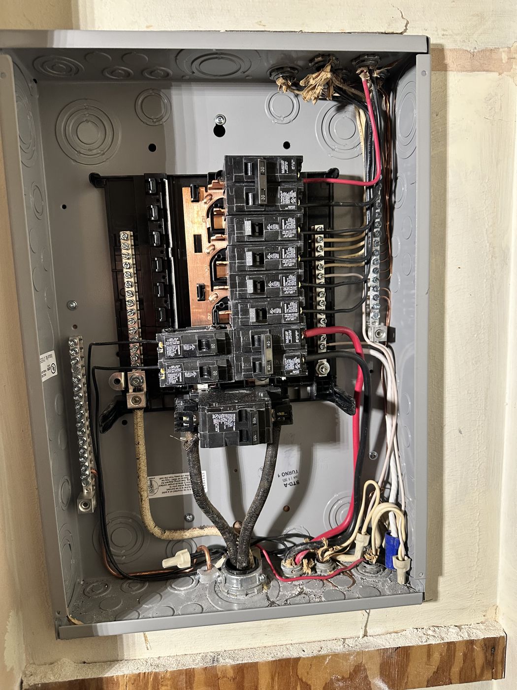The new breaker panel installed in the same spot